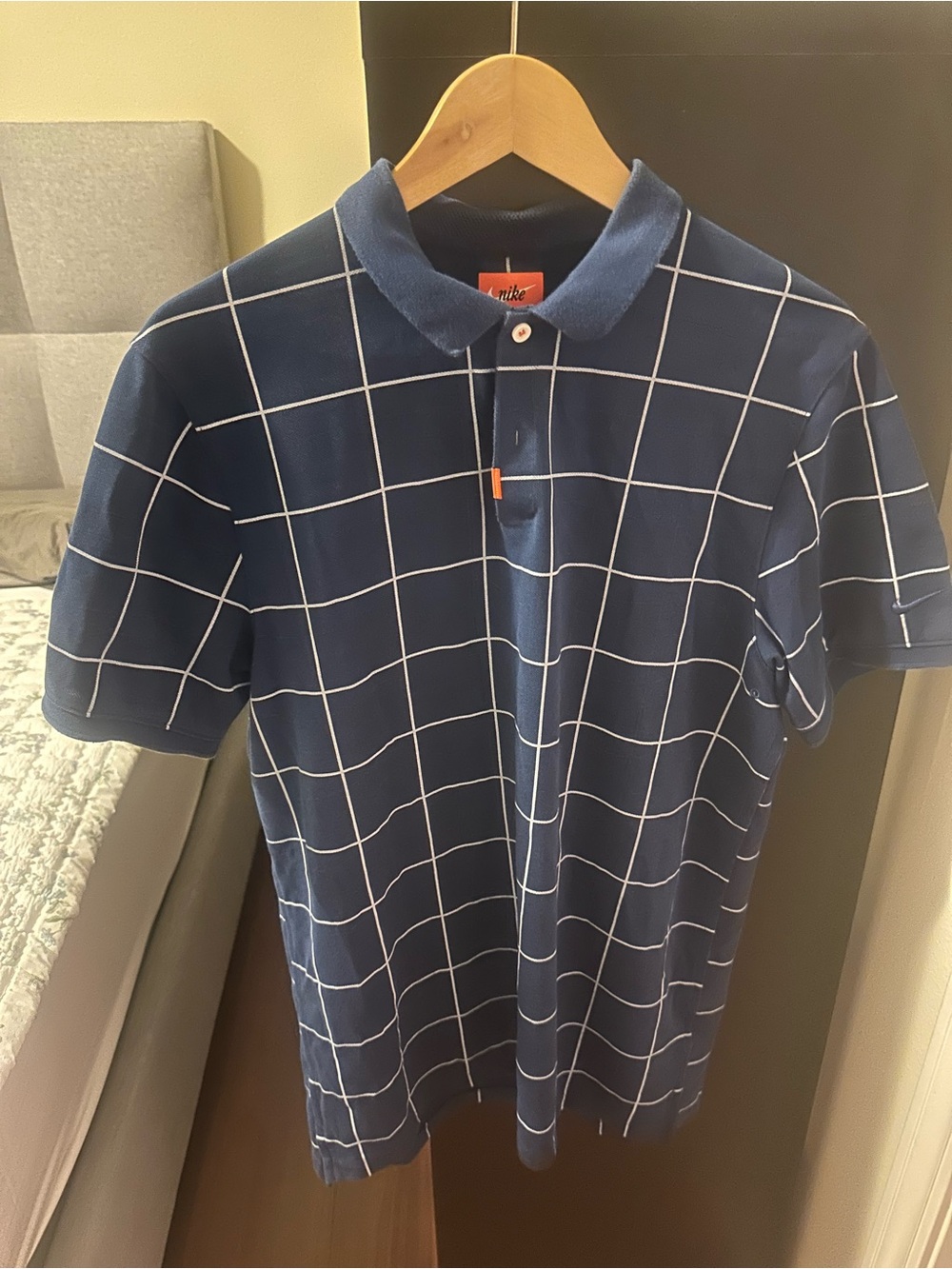 Nike Men's Navy Polo with White Grid Pattern